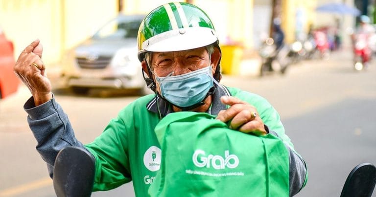 Grab lần đầu có lãi