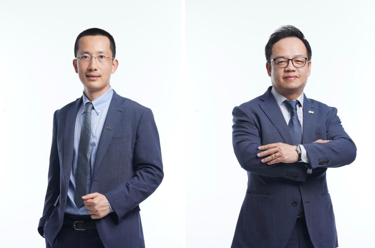 Ông Vũ Thành Trung (bên trái) và ông Lê Xuân Vũ (bên phải).