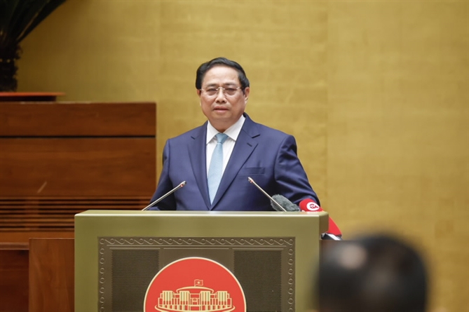 Thủ tướng: Phấn đấu tăng trưởng GDP khoảng 8% năm 2025 Thủ tướng Phạm Minh Chính trình bày những nội dung chủ yếu về tình hình KTXH năm 2024, giải pháp tăng tốc phát triển KTXH năm 2025 - Ảnh: VGP/Nhật Bắc